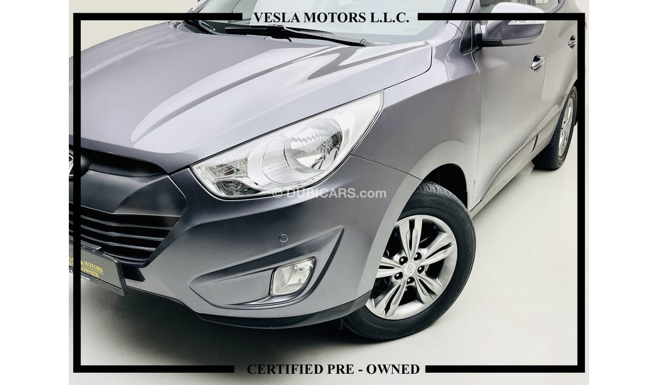 Used Hyundai Tucson LEATHER SEATS + NAVIGATION + 4WD / GCC / 2014
