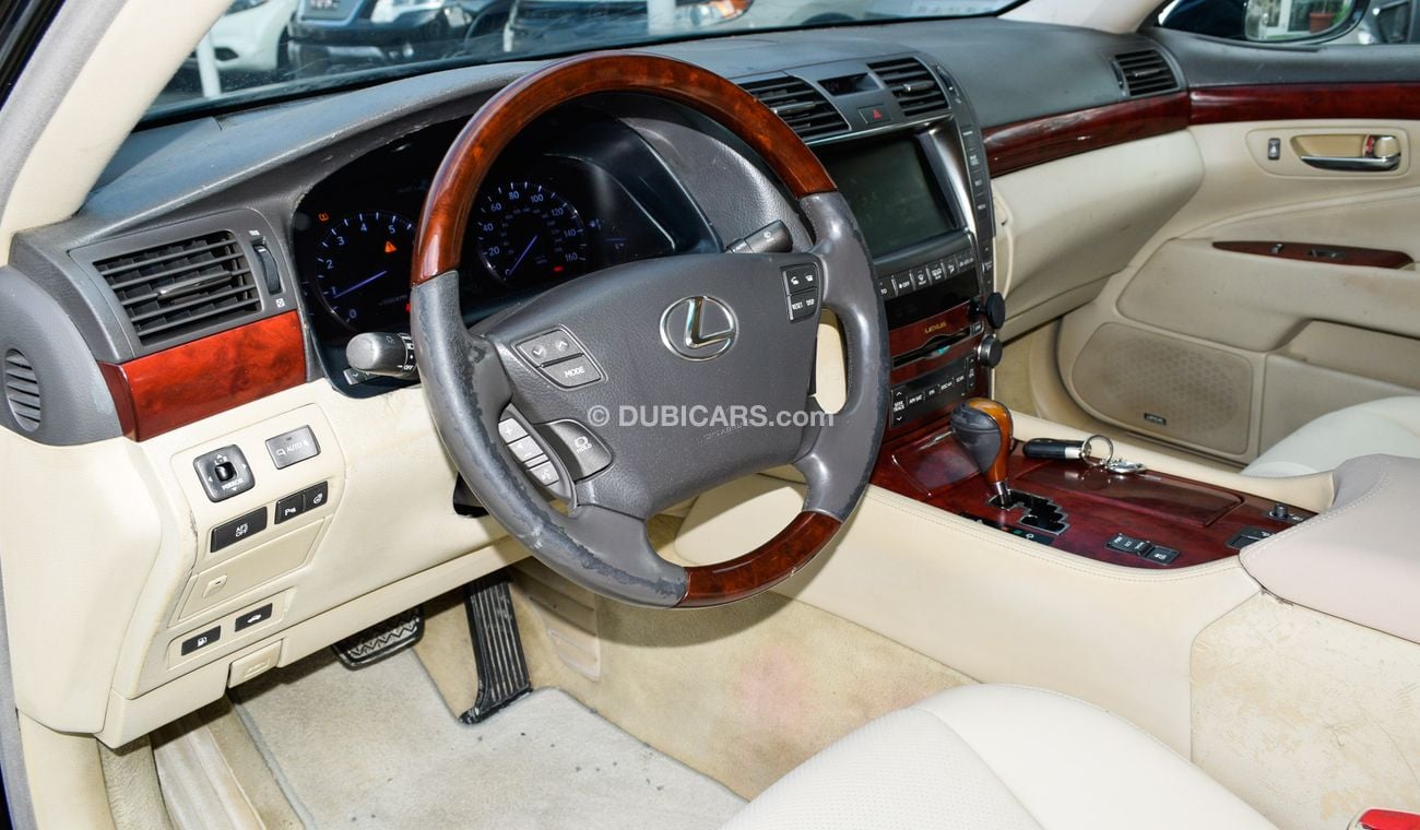 Lexus LS460 Imported 2008 black color inside beige number one leather hatch in excellent condition