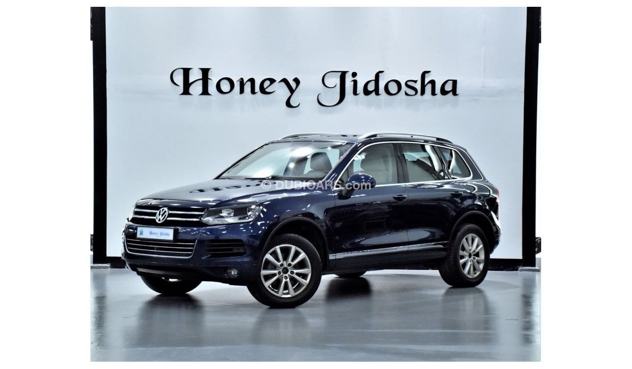 Volkswagen Touareg EXCELLENT DEAL for our Volkswagen Touareg ( 2011 Model! ) in Blue Color! GCC Specs