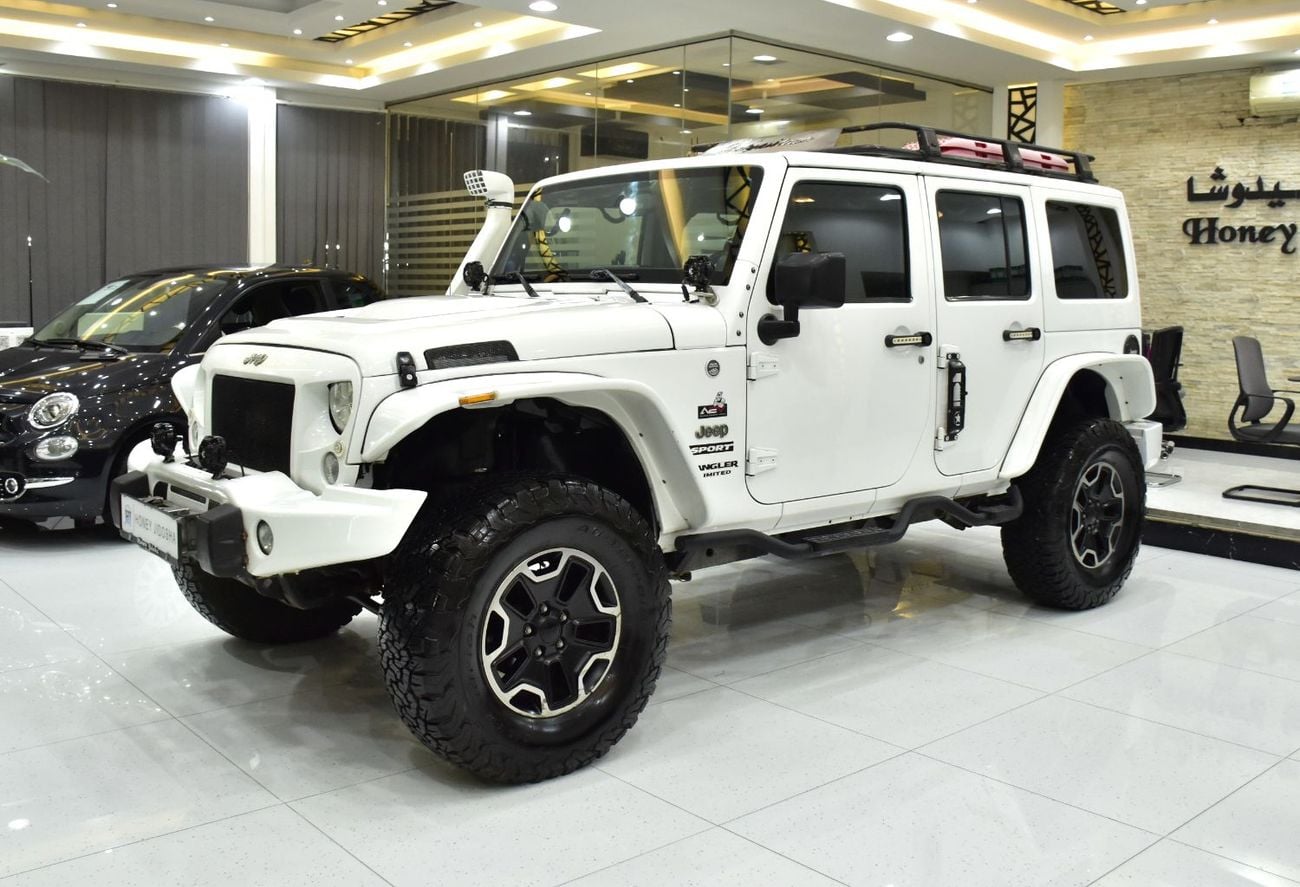 Jeep Wrangler EXCELLENT DEAL for our Jeep Wrangler Unlimited Sport ( 2014 Model ) in White Color GCC Specs