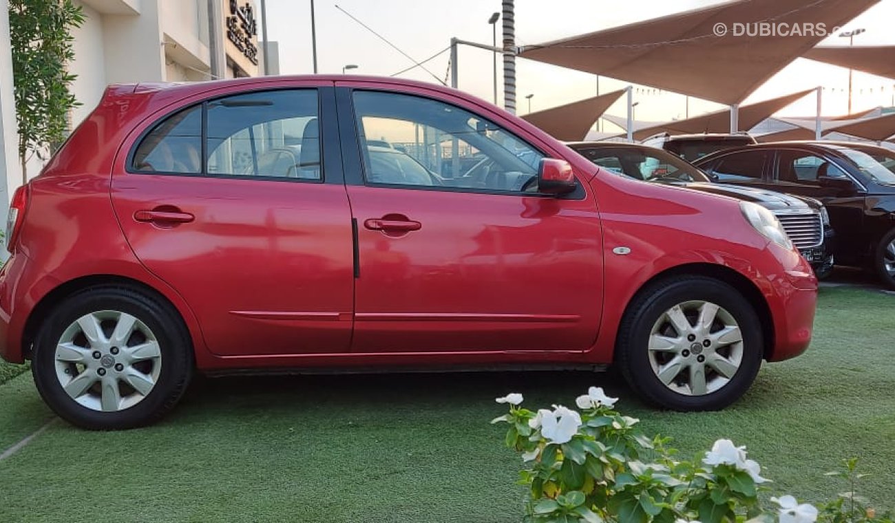 Nissan Micra Gulf number one, without accidents, fingerprint rings, sensors, back wing, electric glass, control m