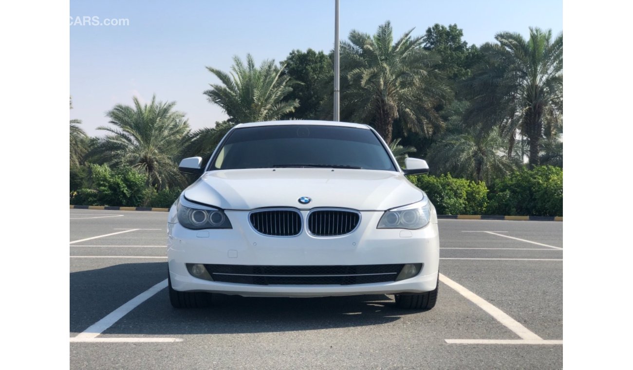 BMW 523i Model 2010 GCC car perfect condition inside and outside full option sun roof leather seats back came