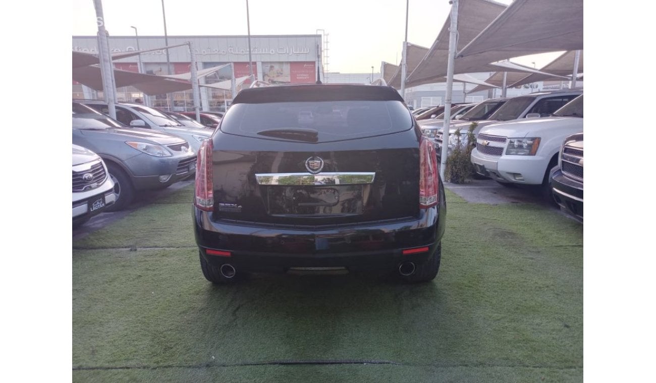 Cadillac SRX CADILAC. SRX. STATION GCC MODEL 2011 BLACK COLORE VERY GOOD CONDITION