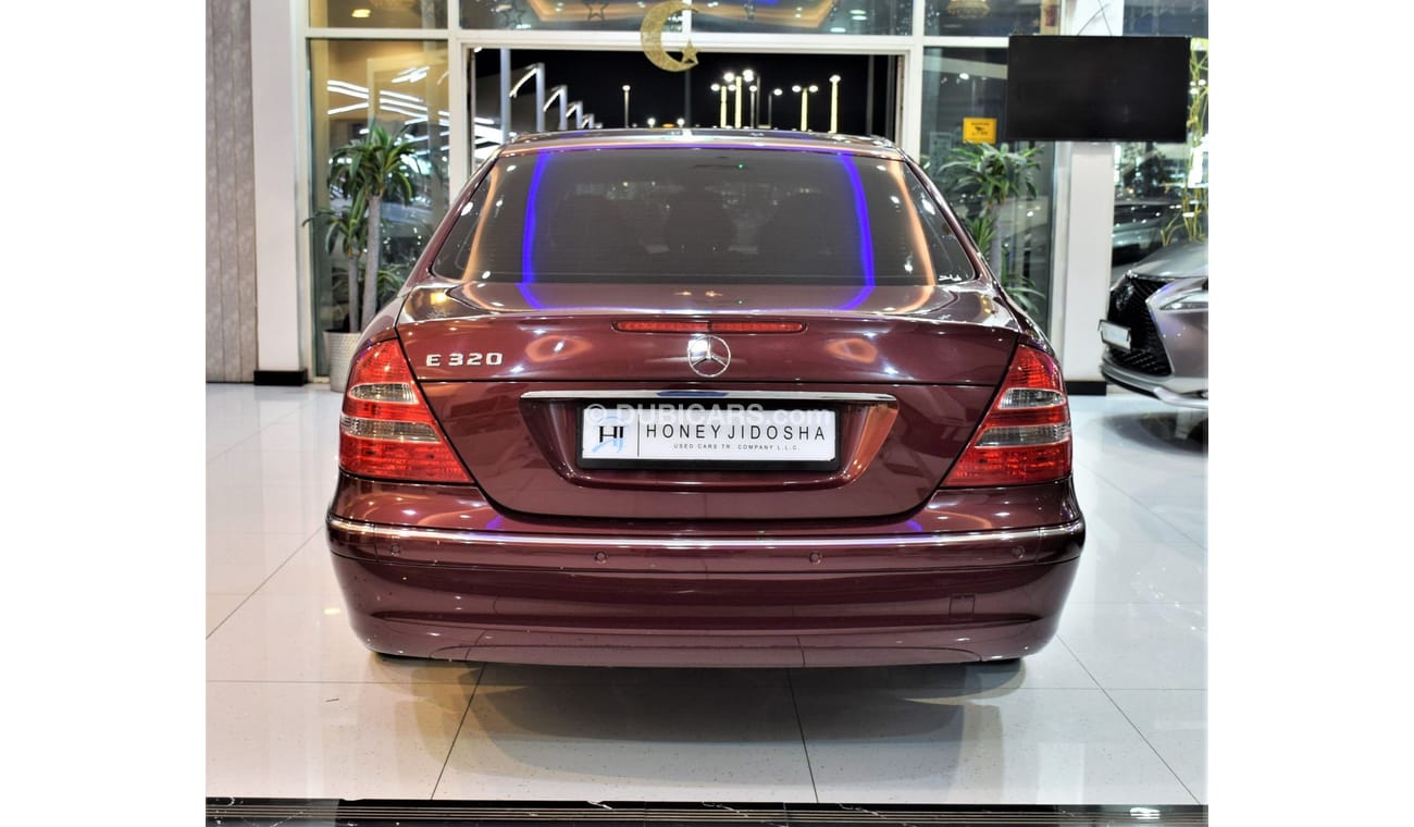 Mercedes-Benz E 320 EXCELLENT DEAL for our Mercedes Benz E320 ELEGANCE ( LIMOUSINE ) 2004 Model!! in Burgundy Color! GCC