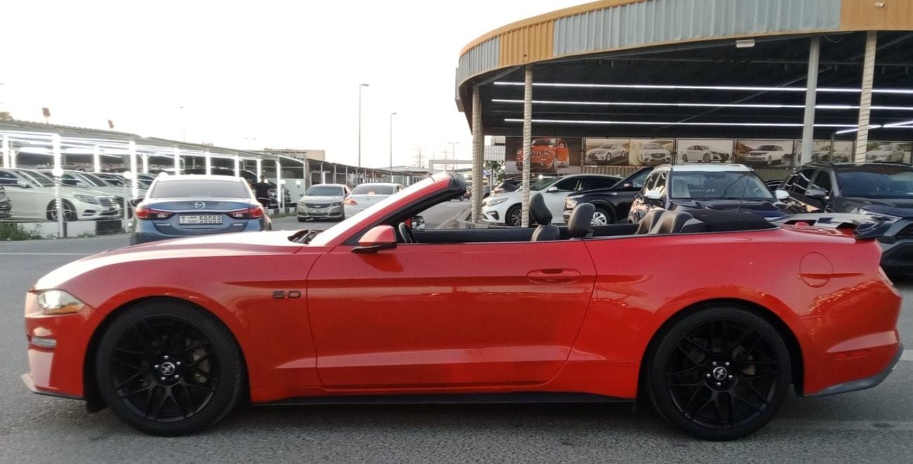 Ford Mustang Ford mustang ecoboost convertible V4  Body kit GT Model 2019 Price: 68000 Dhs Mileage: 44000 Mi Spec