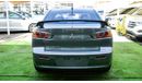 Mitsubishi Lancer Gulf gray color inside beige without accidents Rings rear wing sensors fog lights in excellent condi