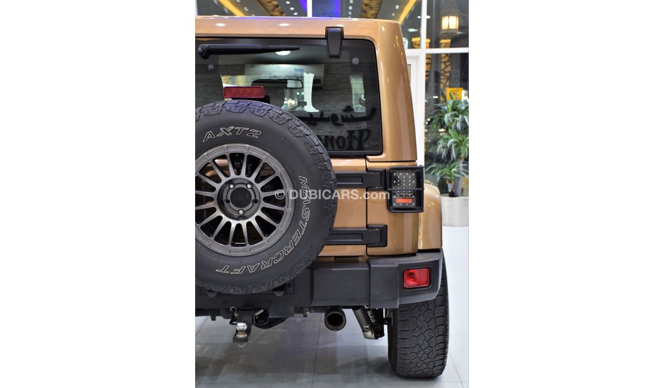 Jeep Wrangler Sahara EXCELLENT DEAL for our Jeep Wrangler UNLIMITED SAHARA 4x4 ( 2015 Model! ) in Brown Color! GCC
