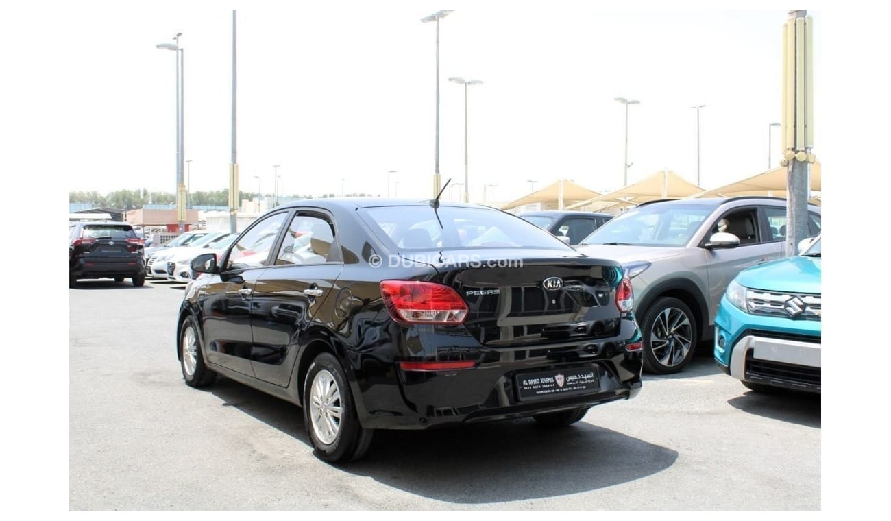 كيا بيجاس MPI توب خالية من الحوادث - خليجي - رقم 1 - الفل - السيارة بحالة الوكالة من الداخل والخارج
