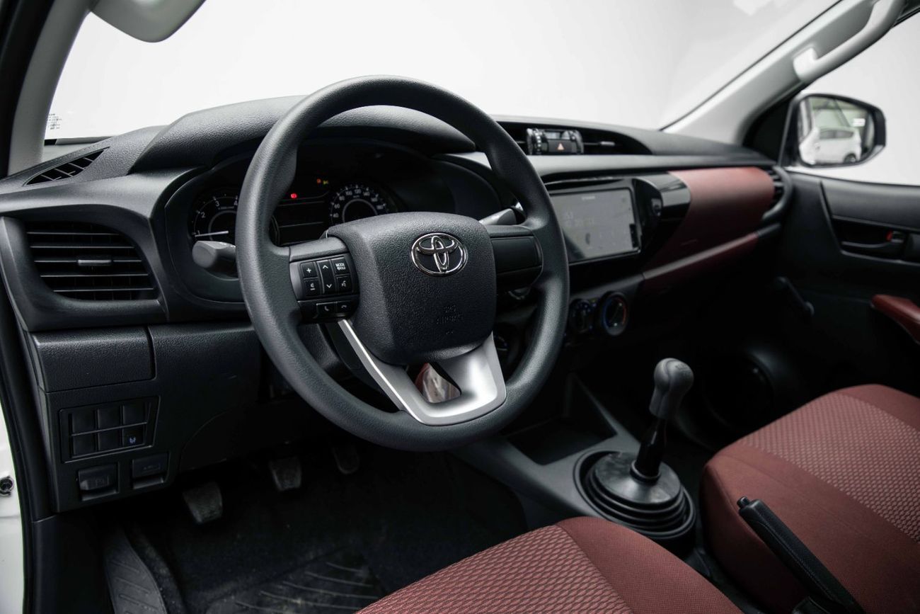 Toyota Hilux DLX 2.4L - Super White Inside Maroon | Export Only