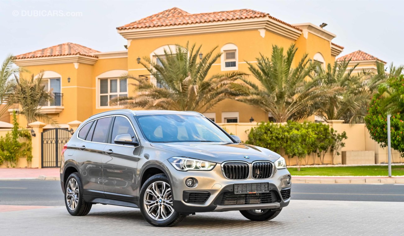 BMW X1 20i sDrive  | 2,233 P.M | 0% Downpayment | Full Option |  Agency Warranty and Service Package!