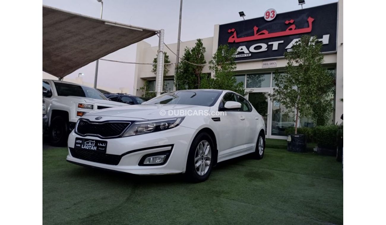 كيا أوبتيما خليجي 2014 لون ابيض داخل بيج رقم 2 رنجات  أنوار ضباب راديو FM مثبت سرعه حساسات لاتحتاج الي مصاريف