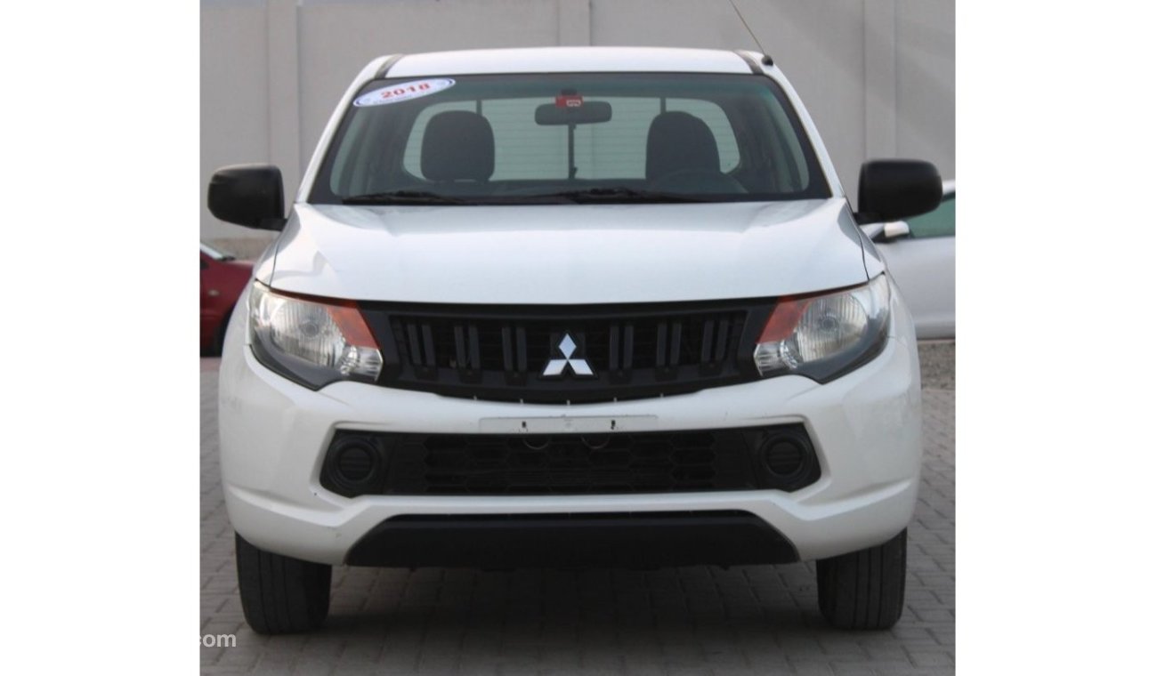 Mitsubishi L200 MITSUBISHI L200 WHITE GCC 2018 EXCELLENT CONDITION WITHOUT ACCIDENT