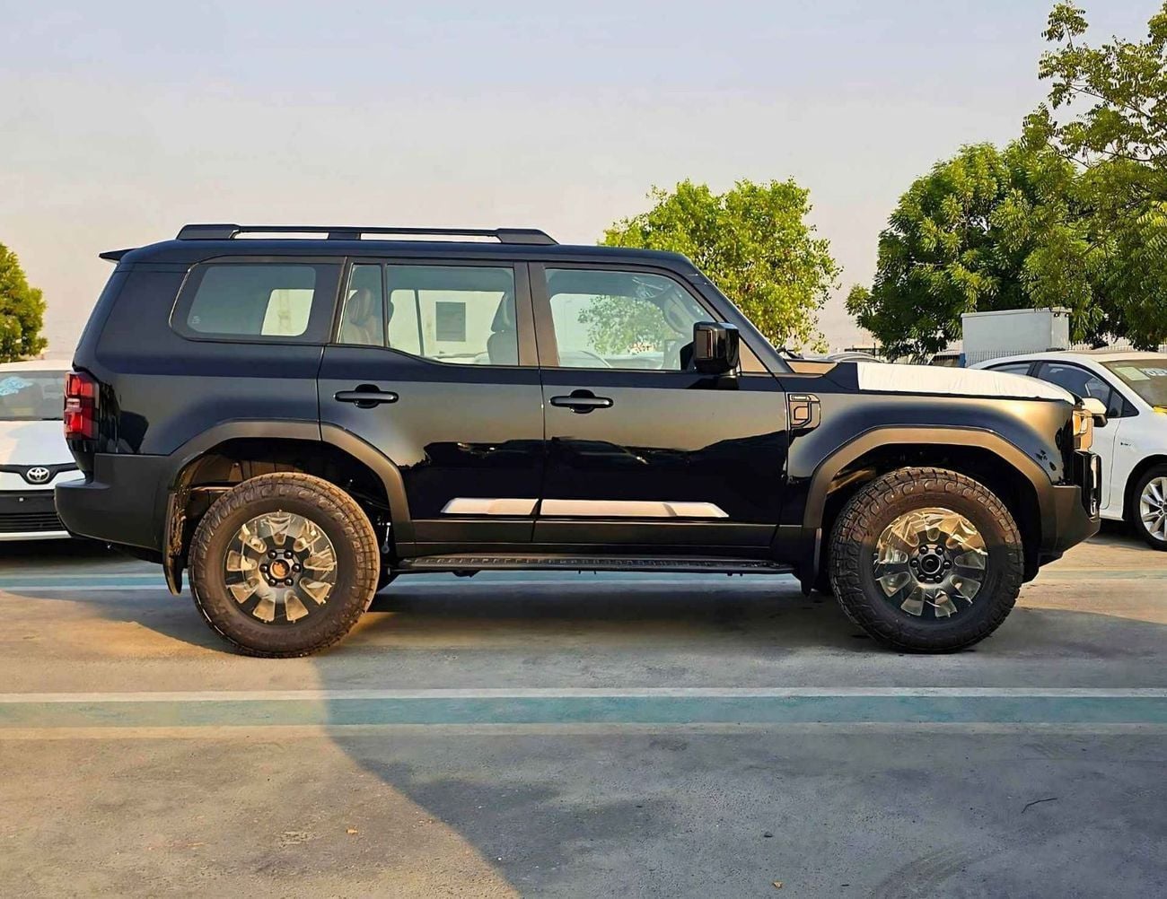 تويوتا برادو ADVENTURE TURBO / 2.4L V4 PETROL / MID OPTION / DRIVER POWER SEATS (CODE # PR24S2)