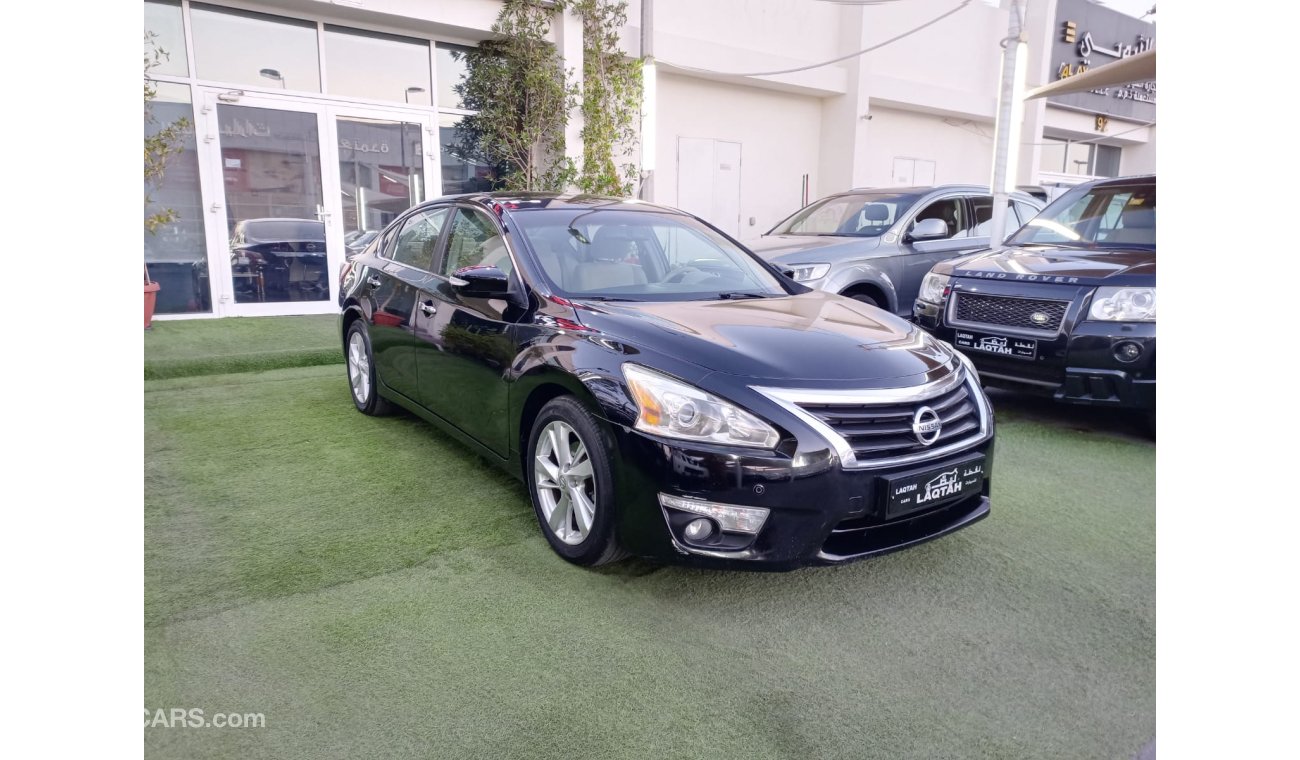 Nissan Altima Model 2013 GCC, fingerprint cruise control, wheels, sensors, screen, camera, in excellent condition