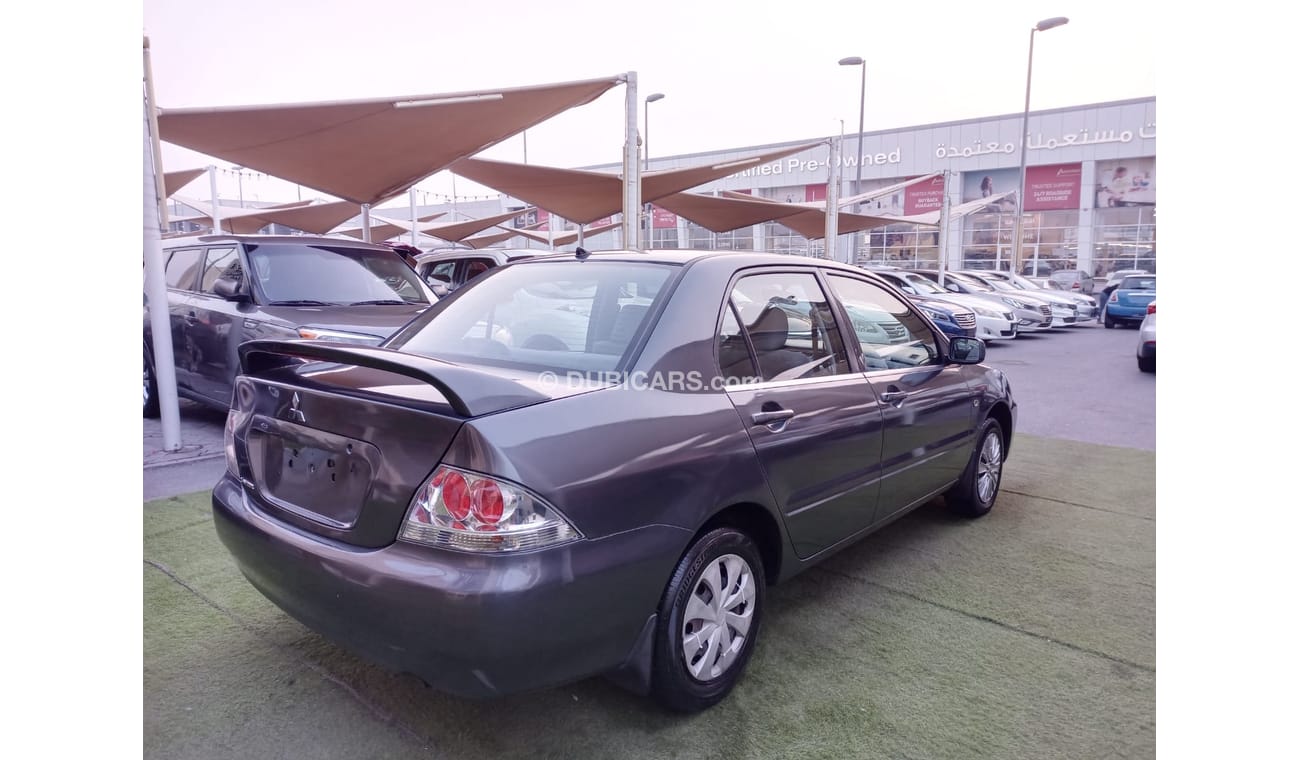 ميتسوبيشي لانسر 1300 سى سى خليجى بدون حوادث أوتوماتيك جناح خلفى تكييف باور راديوFM  بحالة ممتازة