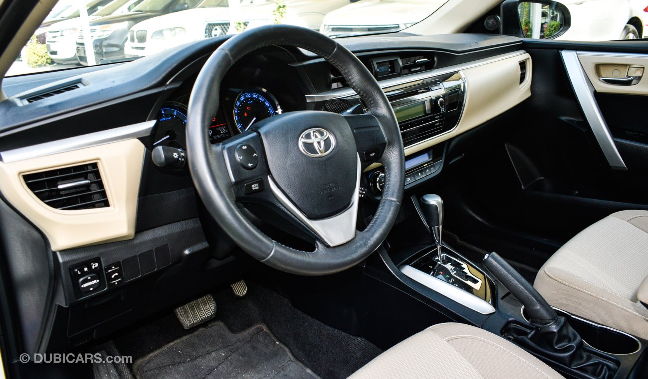 Toyota Corolla Gulf number one fingerprint slot, rear camera, control screen, cruise control, sensors, in excellent