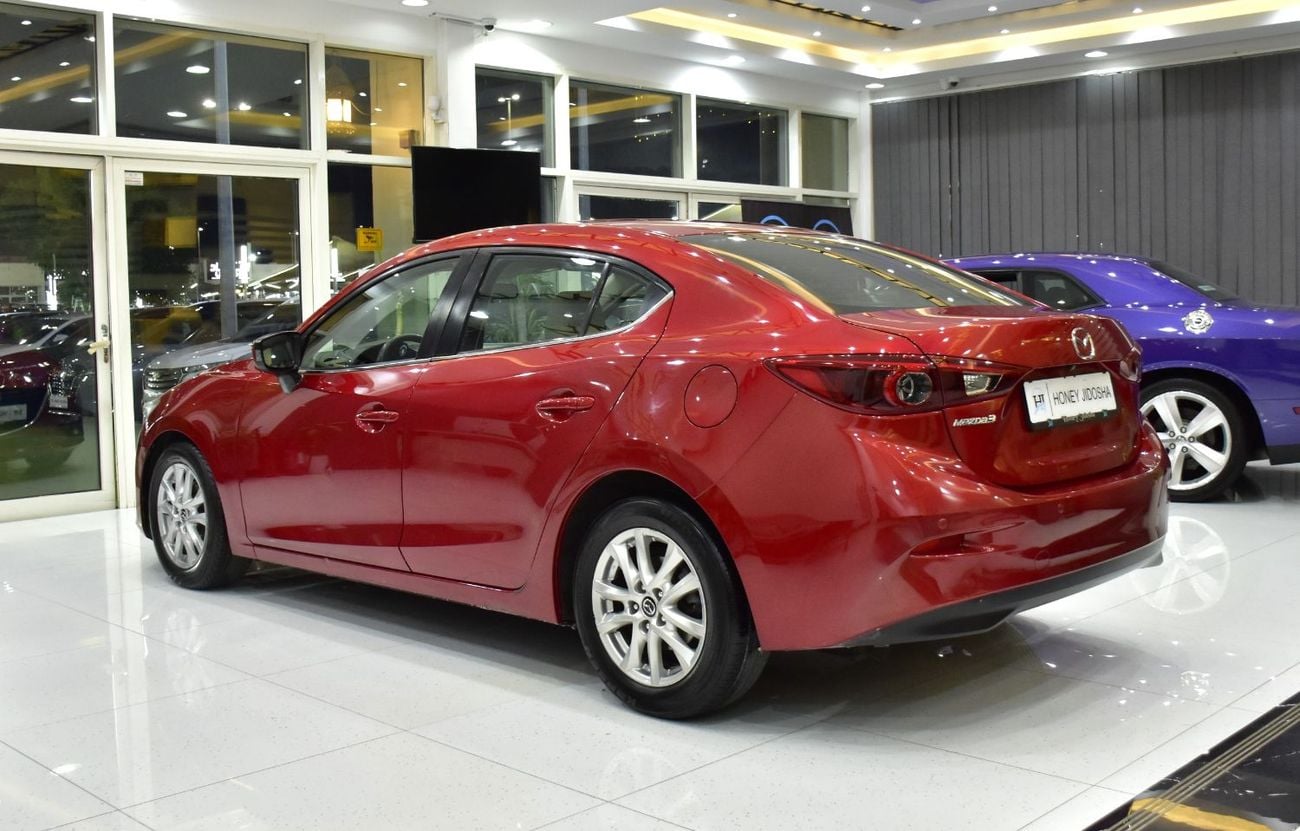 Mazda 3 EXCELLENT DEAL for our Mazda 3 ( 2015 Model ) in Red Color GCC Specs
