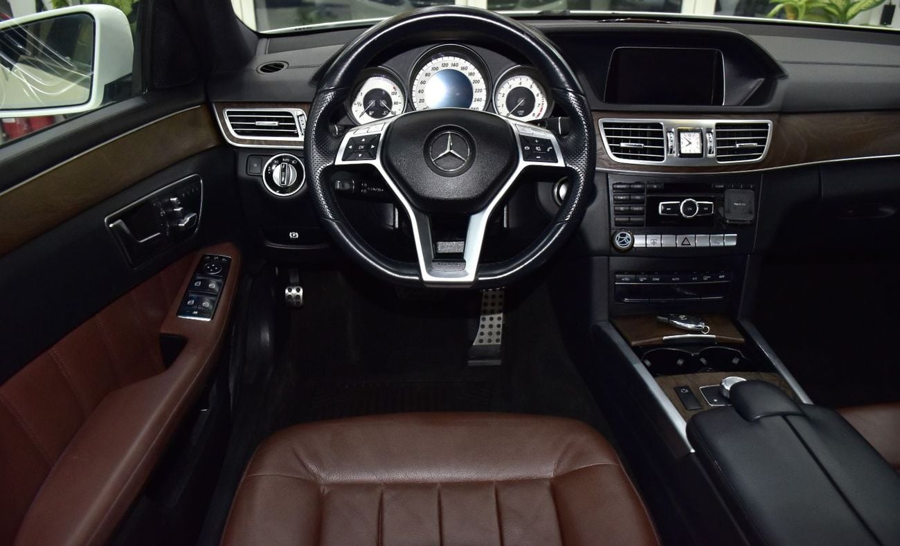 Mercedes Benz E300 AVANTGARDE SPORT EXCELLENT DEAL for our Mercedes Benz E300 ( 2014 Model ) in White Color GCC Specs