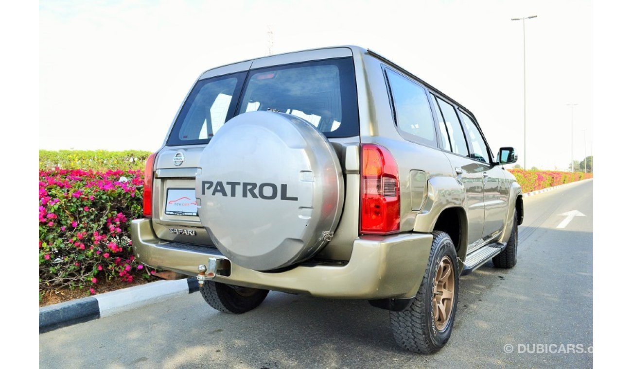 نيسان باترول سفاري GCC NISSAN PATROL SAFARI 2004 - CAR IN GOOD CONDITION - NO ACCIDENT - PRICE NEGOTIABLE