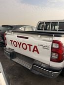 Toyota Hilux 2.7L - Super White Inside Red