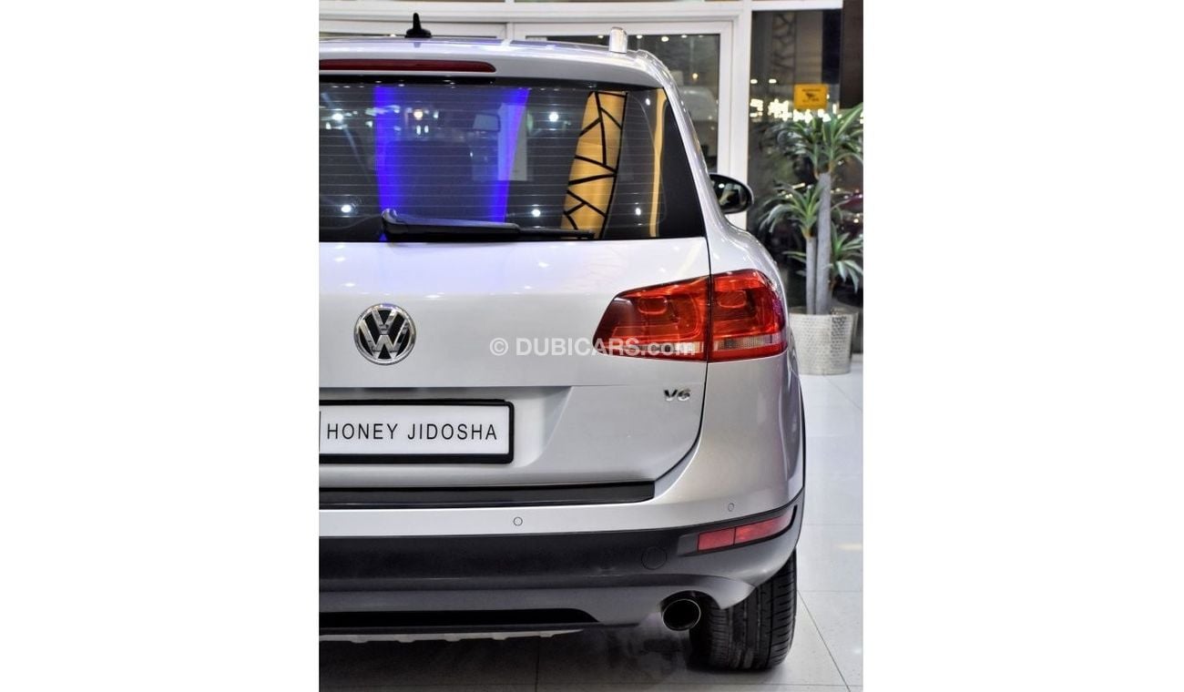 Volkswagen Touareg EXCELLENT DEAL for our Volkswagen Touareg ( 2012 Model ) in Silver Color GCC Specs