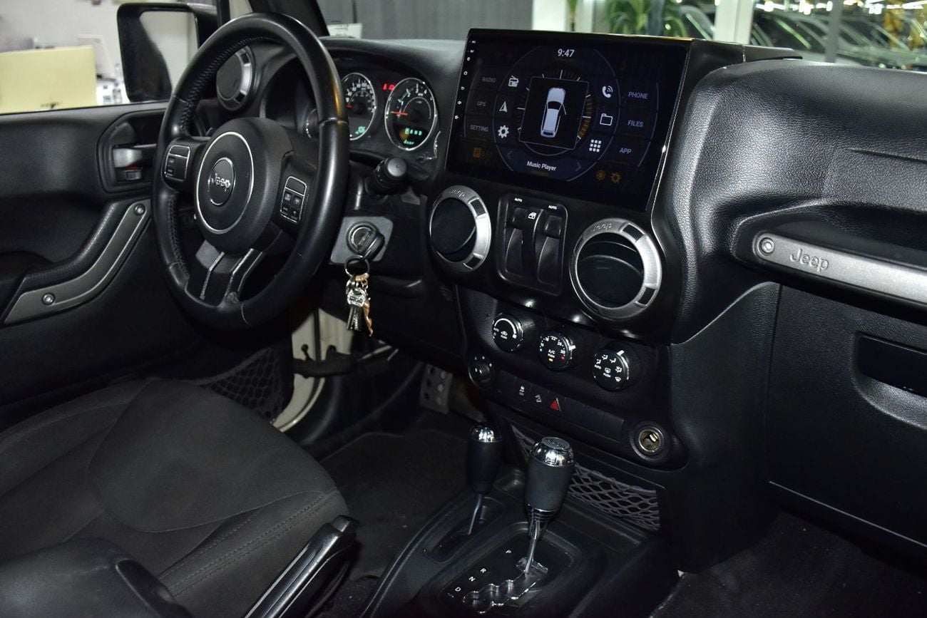 Jeep Wrangler SPORT EXCELLENT DEAL for our Jeep Wrangler Sport ( 2017 Model ) in Beige Color GCC Specs