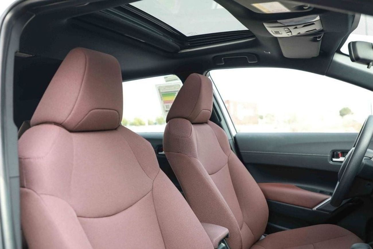 تويوتا كورولا كروس 2025 TOYOTA COROLLA CROSS MID 1.8 Hybrid - PLATINUM WHITE PEARL inside RED | Export Only