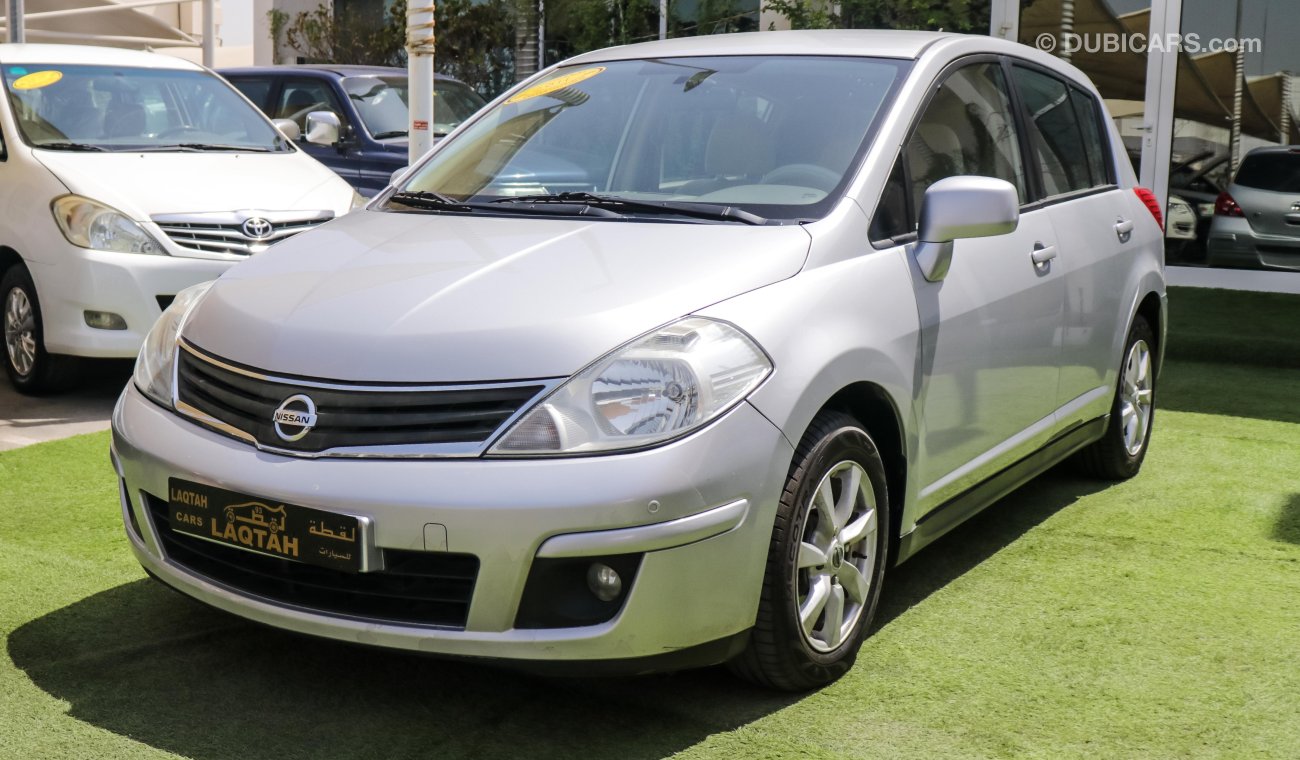 Nissan Tiida Gulf car in excellent condition do not need any expenses