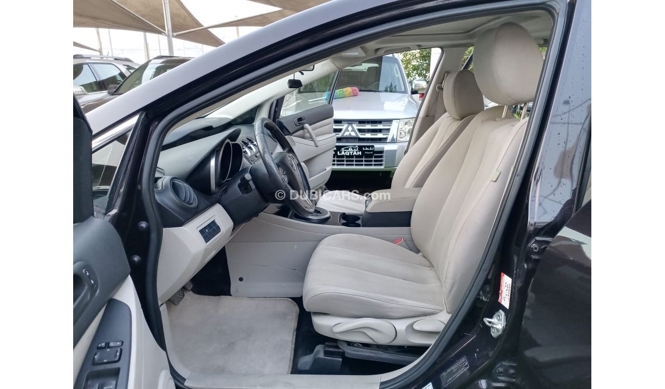 Mazda CX7 Gulf model 2012, cruise control slot, rear spoiler sensor wheels, in excellent condition, you do not