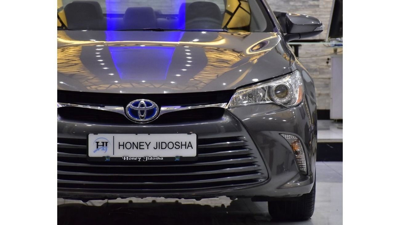 Toyota Camry EXCELLENT DEAL for our Toyota Camry LE Hybrid ( 2017 Model ) in Grey Color American Specs