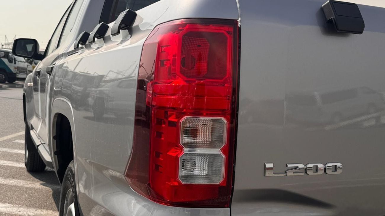 ميتسوبيشي L200 2.4 L DIESEL DOUBL CABIN 4X4 5MT MID -LINE