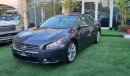 Nissan Maxima Gulf - number one - slot - leather - screen - cruise control - in excellent condition, you do not ne