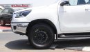 Toyota Hilux 2.4L diesel  . White 2024 model, M/T Wide body with Chrome bumper