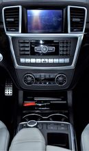 Mercedes-Benz ML 63 AMG EXCELLENT DEAL for our Mercedes Benz ML63 AMG ( 2013 Model ) in Dark Blue Color GCC Specs