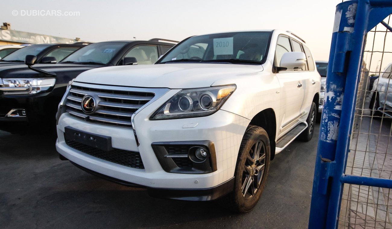 لكزس LX 570 FACELIFTED TO 2015 sports ( RIGHT HAND DRIVE ) ( EXPORT ONLY) pearl white with tan interior