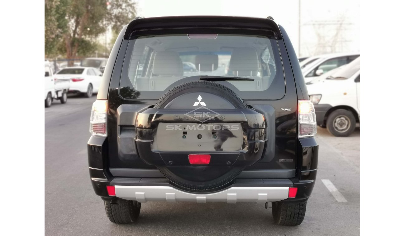 ميتسوبيشي باجيرو 3.5L, 16" Rims, Rear Parking Sensor, Front and Rear A/C, Fabric Seats, DVD, 4WD, AUX-USB (LOT # 863)