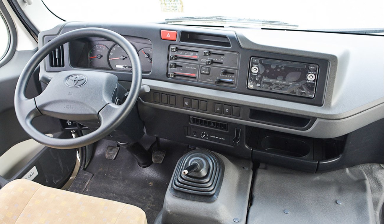 Toyota Coaster 4.2 High Roof 23 seats