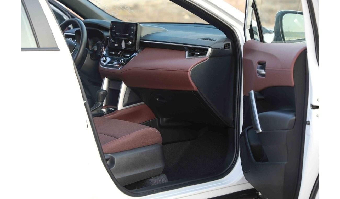 تويوتا كورولا كروس 2024 TOYOTA COROLLA CROSS 1.8 Hybrid MID - PLATINUM WHITE PEARL inside RED | Export Only