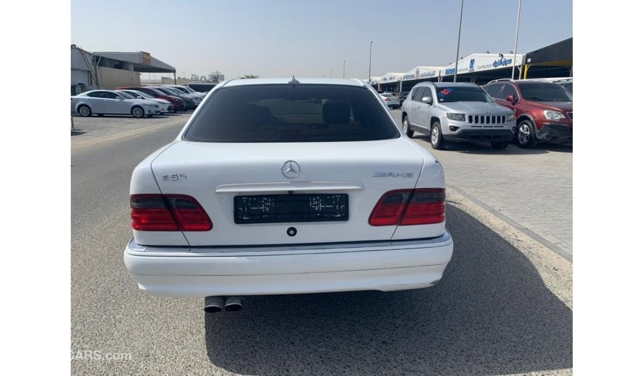 مرسيدس بنز E 320 موديل 1998 امريكي 6 سلندر كيت AMG 55 ابيض داخل بيج عداد الميل 198000