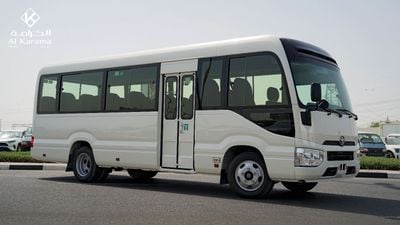 Toyota Coaster DLX - 4.2L Manual - 23 Seater Bus - Power Door - AC/Heater - Audio/AM/FM