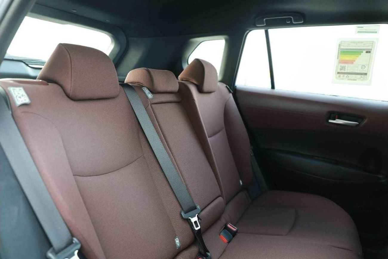 تويوتا كورولا كروس 2024 TOYOTA COROLLA CROSS 1.8 Hybrid MID - Celestite Gray Me inside RED | Export Only