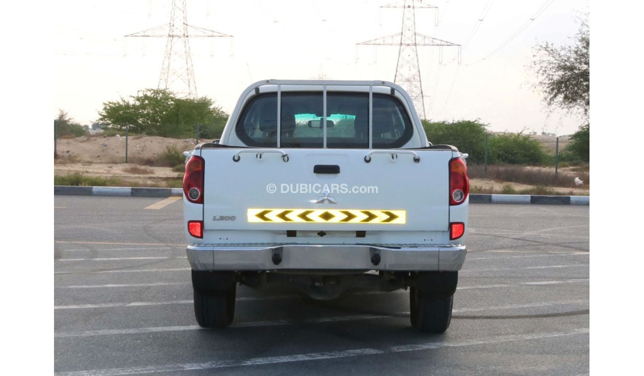 Mitsubishi L200 2015 | DIESEL 4X4 DOUBLE CABIN PICKUP WITH GCC SPECS AND EXCELLENT CONDITION