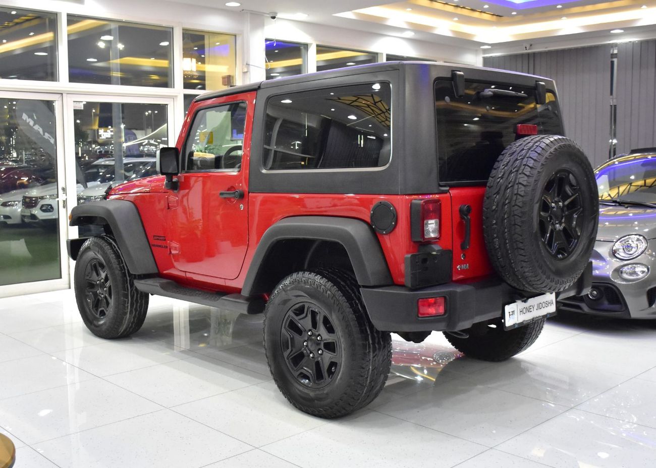 Jeep Wrangler EXCELLENT DEAL for our Jeep Wrangler Sport ( 2014 Model ) in Red Color GCC Specs
