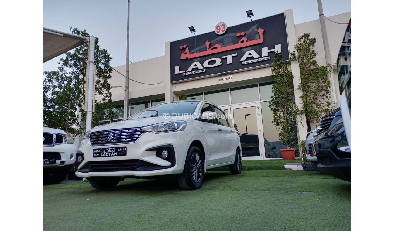 Suzuki Ertiga 2019 model, agency dye, 1600 cc, imprint, white color, rear wing, alloy wheels, air conditioning, wo