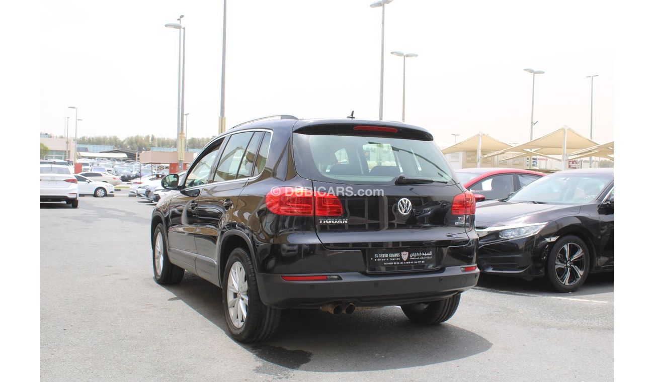 فولكس واجن تيجوان SE خالية من الحوادث - خليجي - مكينة 1400 سي سي - تيربو - السيارة بحالة ممتازة من الداخل والخارج