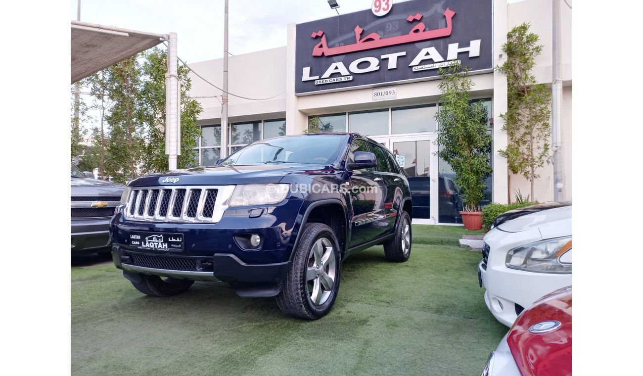 جيب جراند شيروكي موديل 2013 خليجى لون ازرق داخل زعفرانى فتحة جلد مثبت بحالة ممتازة لاتحتاج لأى مصاريف