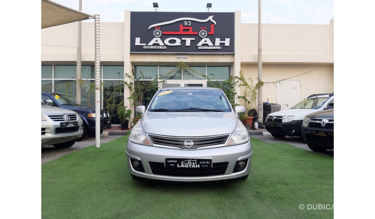 Nissan Tiida 2011 Gulf silver in excellent condition