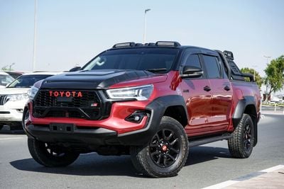 تويوتا هيلوكس The Toyota Hilux is a legendary, tough, and reliable mid-size body-on-frame pickup truck known for i
