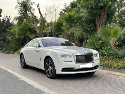 Rolls-Royce Wraith 2015 Rolls Royce Wraith | GCC Specs | 6.6L V12 | 624 HP | 66k KM | WHITE/RED | Starlight Headliner |