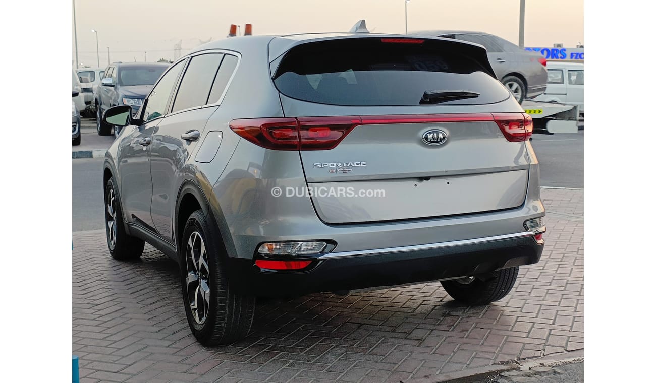 كيا سبورتيج 2.4L PETROL / DVD+CAMERA / REAR A/C (CODE # 93908)